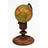 AN EARLY VICTORIAN POCKET TERRESTRIAL GLOBE inscribed 'Model of the Earth by J Manning', 4.4cm