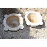 A PAIR OF ANTIQUE MARBLE MORTARS each with four lugs, 36cm diameter (2)