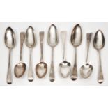 A GROUP OF NINE GEORGE III SILVER OLD ENGLISH PATTERN TABLE SPOONS of various dates and makers,