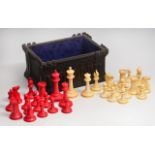 A MID 19TH CENTURY JAQUES STAUNTON PATTERN TURNED IVORY CHESS SET, one side stained red, the other