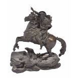 AN OLD BRONZE SCULPTURE DEPICTING NAPOLEON riding forth on a rearing horse, 23cm wide x 24cm high