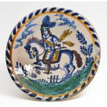 A LATE 17TH CENTURY BLUE DASH CHARGER, POSSIBLY FRIESIAN, C.1690, depicting a horseman with feathers