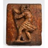 AN ANTIQUE, POSSIBLY 17TH CENTURY, CARVED AND GILT WOODEN PANEL depicting, in higher relief, an