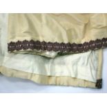 THREE PAIRS OF FRENCH IVORY SILK INTERLINED CURTAINS, the bottoms fringed with French braid, each