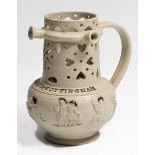 AN EARLY 19TH CENTURY SALT GLAZED ENGLISH PUZZLE JUG with sprigged decoration, depicting various