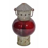 AN OLD LANTERN with spherical red glass and carrying handle, 47cm high with the handle down