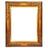 A LARGE GILT CUSHION MOULDED PICTURE FRAME with flower decoration at the corners, the aperture 84.