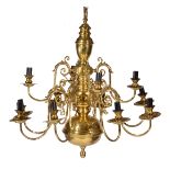 A 17TH CENTURY DUTCH STYLE BRASS CHANDELIER OR ELECTROLIER with central ball finial, turned stem and