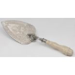 A VICTORIAN CEREMONIAL SILVER PLATED TROWEL presented in 1891, the trowel with a carved ivory handle