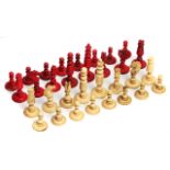 A 19TH CENTURY ORIENTAL TURNED BONE CHESS SET, the king measuring 5.5cm in height