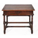 A LATE 17TH CENTURY PINE AND OAK SIDE TABLE with a single frieze drawer, bobbin turned supports