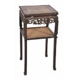 A 19TH CENTURY CHINESE HARDWOOD URN STAND with marble inset top, carved pierced prunus frieze and