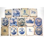 A GROUP OF 14 ANTIQUE BLUE AND WHITE DELFT TILES, with architectural and figural scenes, each