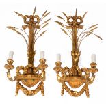 A PAIR OF ANTIQUE CARVED WOOD GILT HANGING WALL LIGHTS with ribbon tied crest and ears of wheat, the