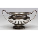 A GEORGE V SILVER SUGAR VASE with gadroon and shell moulded edge, looping handle and reeded body