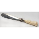 A VICTORIAN SILVER AND IVORY PAGE TURNER in the form of an oar or paddle, with engraved foliate