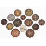 A GROUP OF VARIOUS GROCERS AND OTHER TOKENS, to include one depicting Wellington; one for