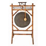 A VICTORIAN BAMBOO FRAMED BRONZE GONG, the gong 48cm  diameter, 17cm in height overall