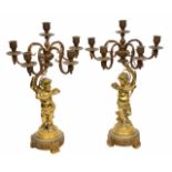 A PAIR OF 19TH CENTURY FRENCH ORMOLU CANDELABRA, each with central sconce and four scrolling