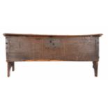 AN ANTIQUE OAK SIX-PLANK COFFER, carved with initials 'IT' to the front and bearing date 1674, 107cm