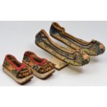 A PAIR OF 19TH CENTURY CHINESE SILK, LINEN, WOOD AND LEATHER MANCHU LADIES SHOES, each decorated