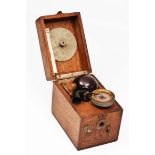 A LATE 19TH/EARLY 20TH CENTURY GERMAN MADE OAK CASED SMALL SIZED PORTABLE GRAMOPHONE, 16cm wide