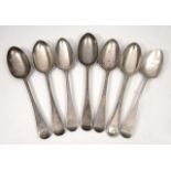 SEVEN VARIOUS SILVER DESSERT SPOONS with marks for London makers approximately 300 grams in weight