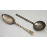 AN OLD DUTCH PEWTER SPOON, the circular bowl with rose and crown touchmark and initials HK