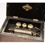 AN OLD CONTINENTAL MUSICAL BOX with removable cylinder, the inside of the lid with label 'No2',