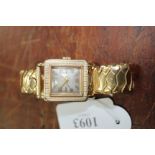 A ROTARY 9 CARAT GOLD GENTLEMAN'S WRISTWATCH with square dial, Arabic numerals dispersed among