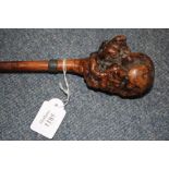 AN ANTIQUE WOODEN WALKING STICK with large burr pommel and a woven white metal collar, 87cm long