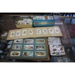 THREE TINS AND VARIOUS ALBUMS OF CIGARETTE CARDS