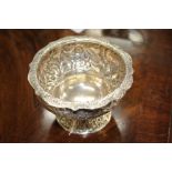 A SCOTTISH SILVER SMALL PEDESTAL BOWL with a flattened shaped rim and all over chased and engraved