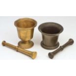 AN OLD BRONZE PESTLE AND MORTAR, the mortar 12cm diameter together with a further pestle and