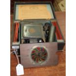 AN EARLY 20TH CENTURY ERNST PLANK MAGIC LANTERN with paraffin illumination and 12 strip slides,