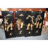 A SET OF FOUR BLACK LACQUERED ORIENTAL SCREENS, each with hardstone inlaid decoration, 34cm x 96cm