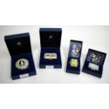 FOUR HALCYON DAYS ENAMEL BOXES to include a commemoration to a state visit to Italy by Her Majesty