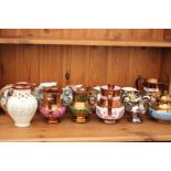 A COLLECTION OF VARIOUS 19TH CENTURY AND LATER SILVER AND COPPER LUSTER JUGS together with a