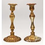 A PAIR OF 19TH CENTURY, POSSIBLY FRENCH, SILVER PLATED CANDLESTICKS each with hexagonal sconces,