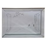 AN ART DECO STYLE RECTANGULAR WALL MIRROR with a panelled glass border and cut glass decoration,