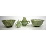 TWO CHINESE TURNED JADE BOWLS, 10cm diameter, together with two miniature koro and covers, the