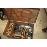 AN OLD TOOL CHEST with various chisels and tools, 82cm wide