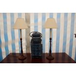 A PAIR OF TURNED WOODEN ELECTRIC TABLE LAMPS, 61cm high together with a blue painted lidded