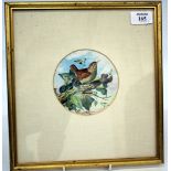 20TH CENTURY ENGLISH SCHOOL A goldfinch perched on a branch, watercolour of silk, 4 1/4" tondo;