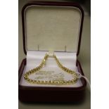 AN 18TH CARAT GOLD DIAMOND SET BRACELET of tier shaped articulated links, approximately 17cm long