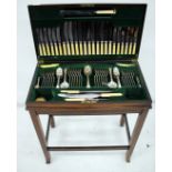 A CANTEEN OF OLD ENGLISH PATTERN SILVER PLATED CUTLERY consisting of twelve table forks, twelve