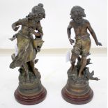 A PAIR OF BRONZED 19TH CENTURY SPELTER FIGURES of a boy and a girl on turned socles 35.5cm high