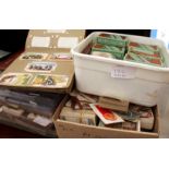 A LARGE QUANTITY OF LOOSE CIGARETTE CARDS and cigarette cards in albums to include Wild Woodbine