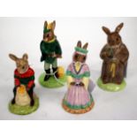 FOUR VARIOUS ROYAL DOULTON BUNNYKINS FIGURES consisting of Robin Hood, Maid Marian, Friar Tuck and