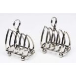 A PAIR OF EARLY TO MID 20TH CENTURY HEAVY SILVER TOAST RACKS by Harrison Fisher & Co with marks